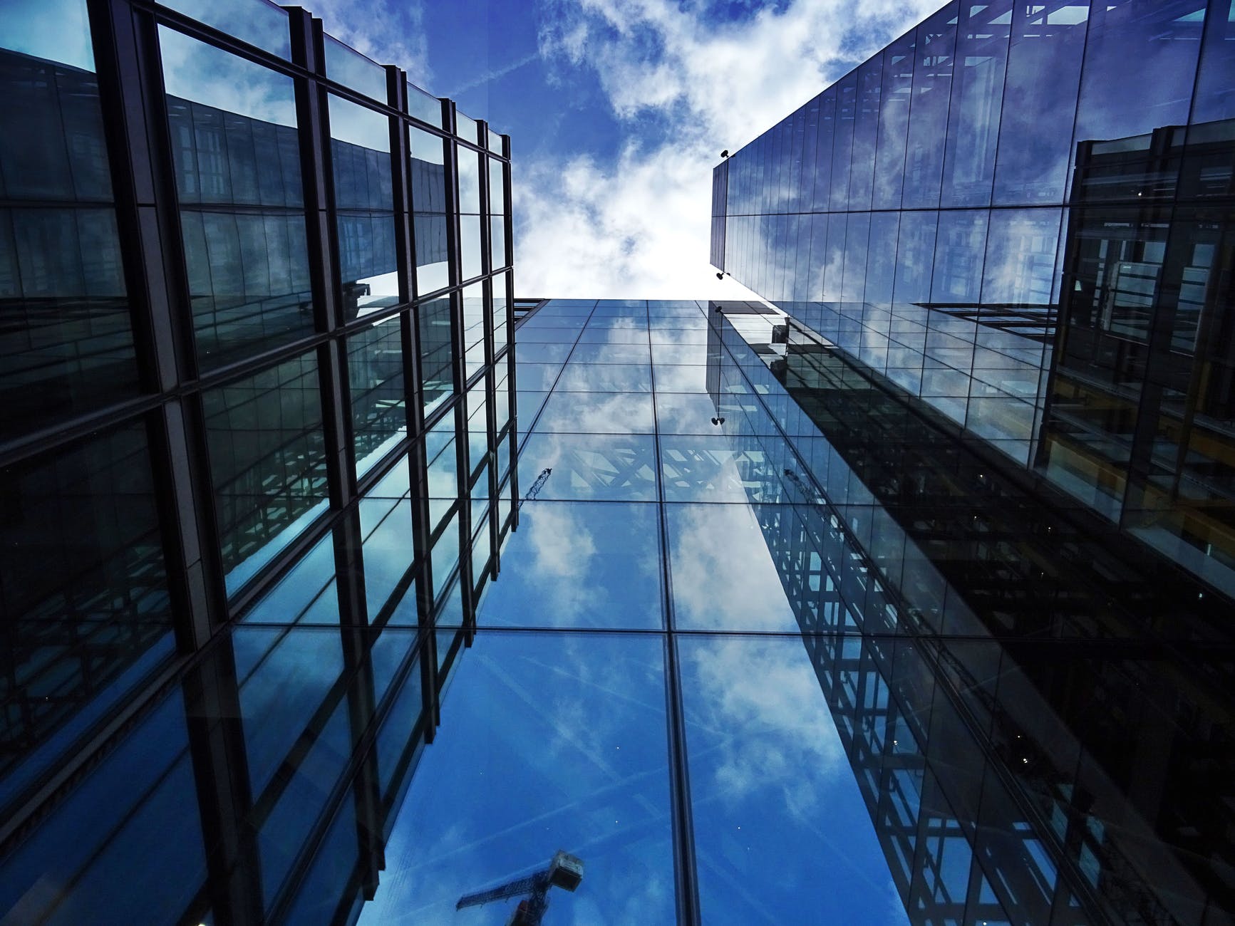 worm s eye view of glass building